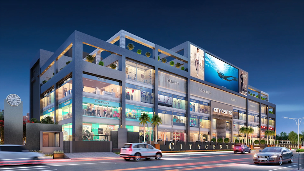 Multi-level commercial building illuminated at dusk